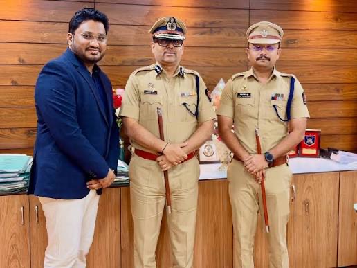 Amitesh Kumar with officers and a visitor at the commissionerate