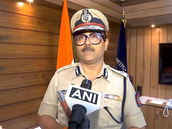 Amitesh Kumar making a statement to the press inside the commissioner's office